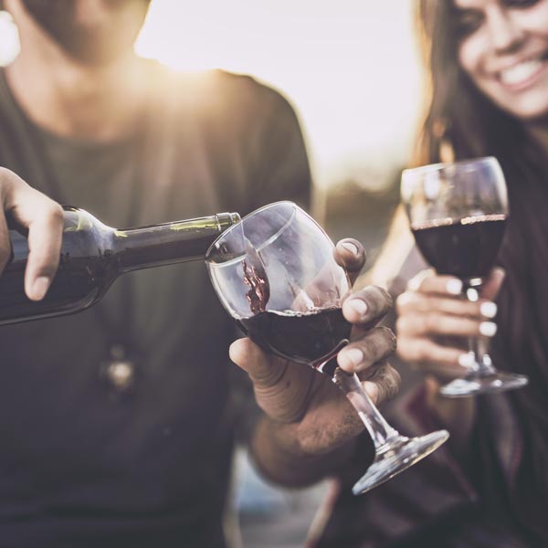 pouring red wine